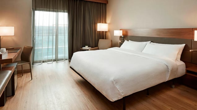 The interior bedroom of a Marriott Hotel.