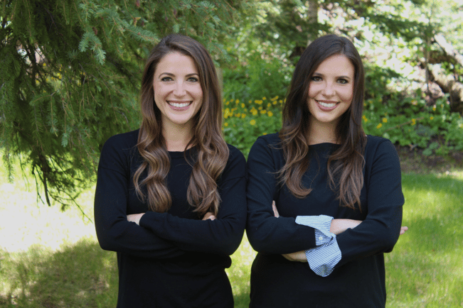 Founders of Dateability, Alexa and Jacqueline Child, posing for a professional photo outdoors.