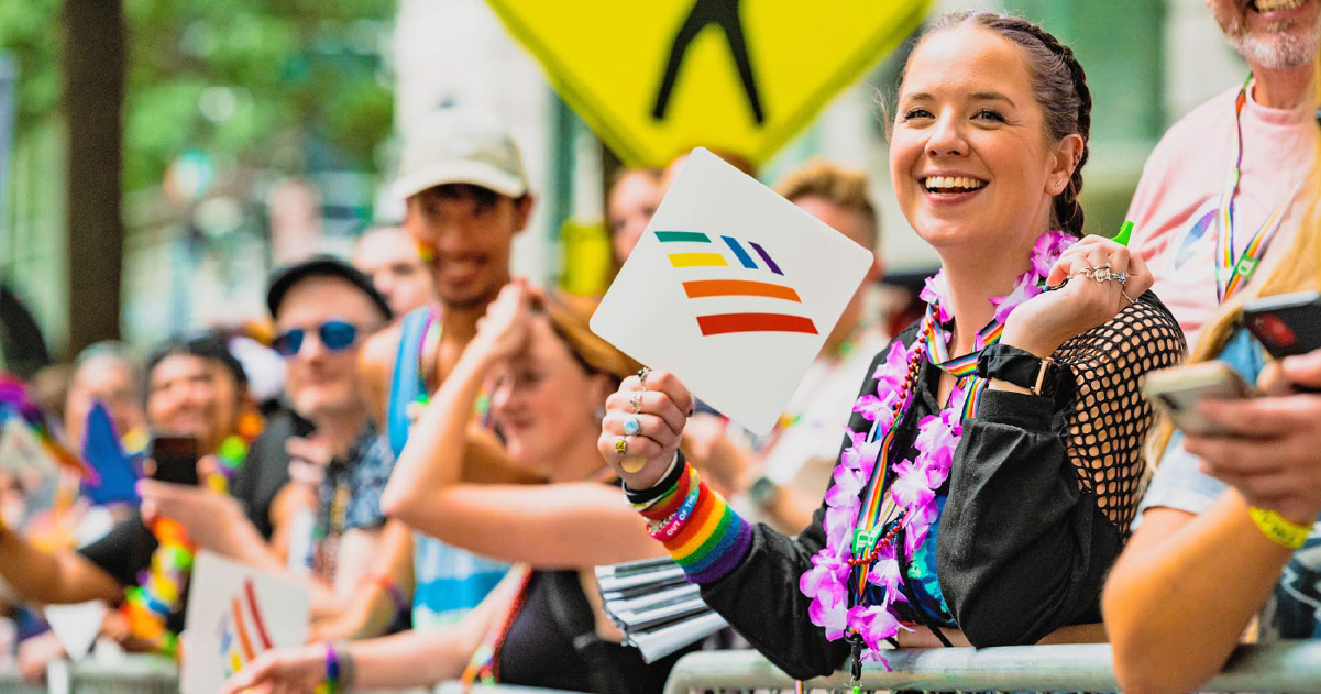 Charlotte Pride festival attendees along the parade route.