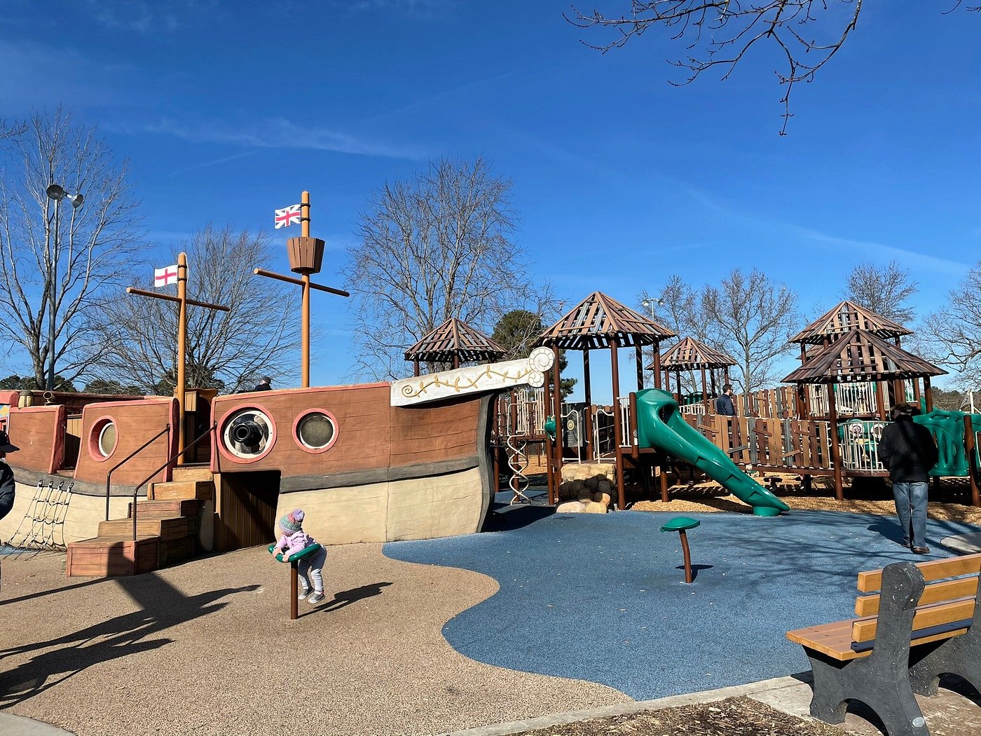 A playground for children of all abilities featuring an accessible pirate ship and wheelchair ramps.