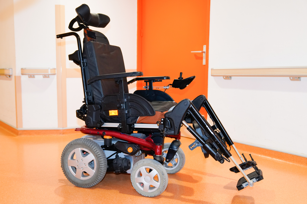 Power wheelchair for persons with complex disabilities.  Displayed in a medical office.